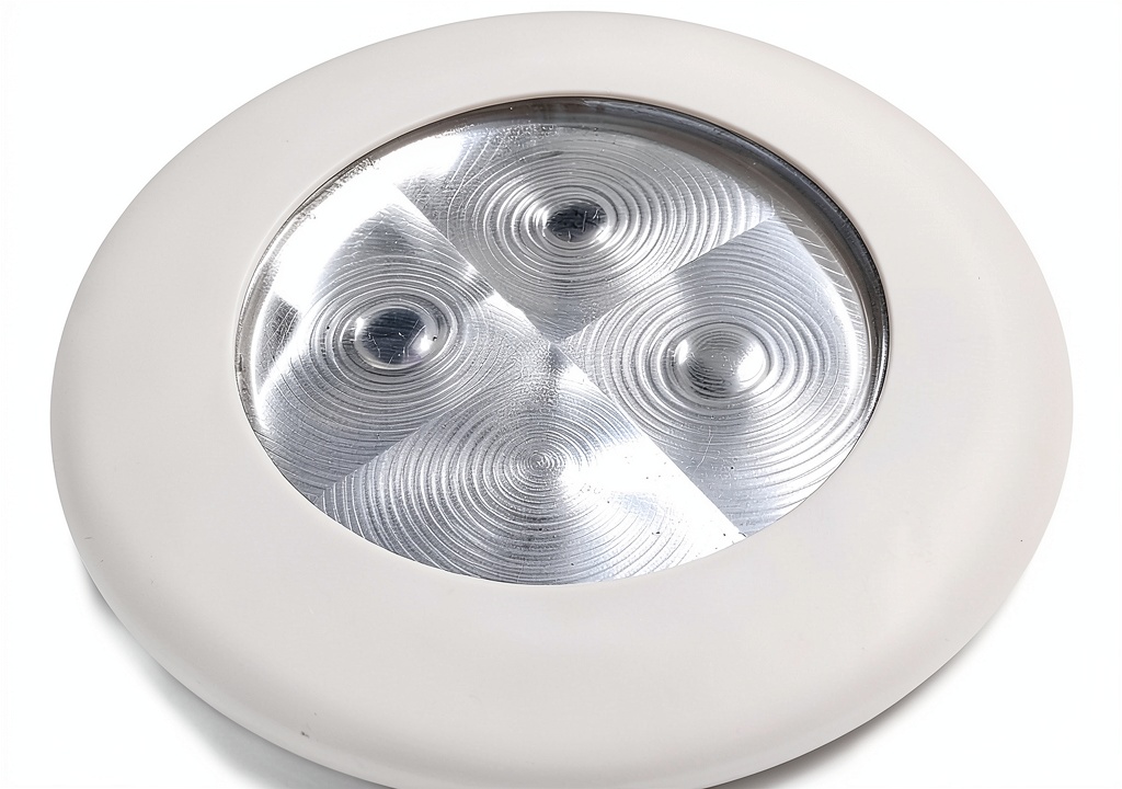 Installing Interior Step Light Hella Plastic Clear Fit on a wooden desk